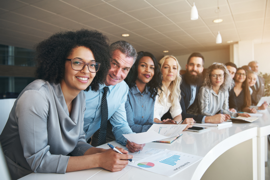 Illustration of a diverse team brainstorming brand storytelling ideas, surrounded by symbols of creativity and emotional connection.